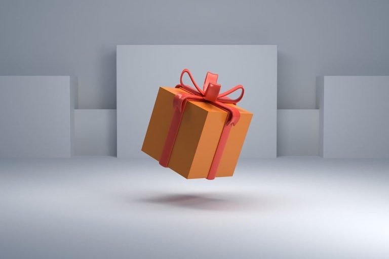 A floating orange gift box with a red ribbon against a minimalist grey background.