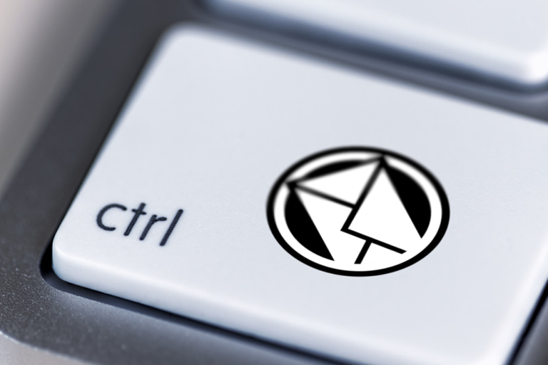 Close-up of a keyboard's Ctrl key with a logo design featuring an email icon.