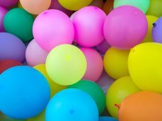 A vibrant assortment of colourful balloons in various shades.