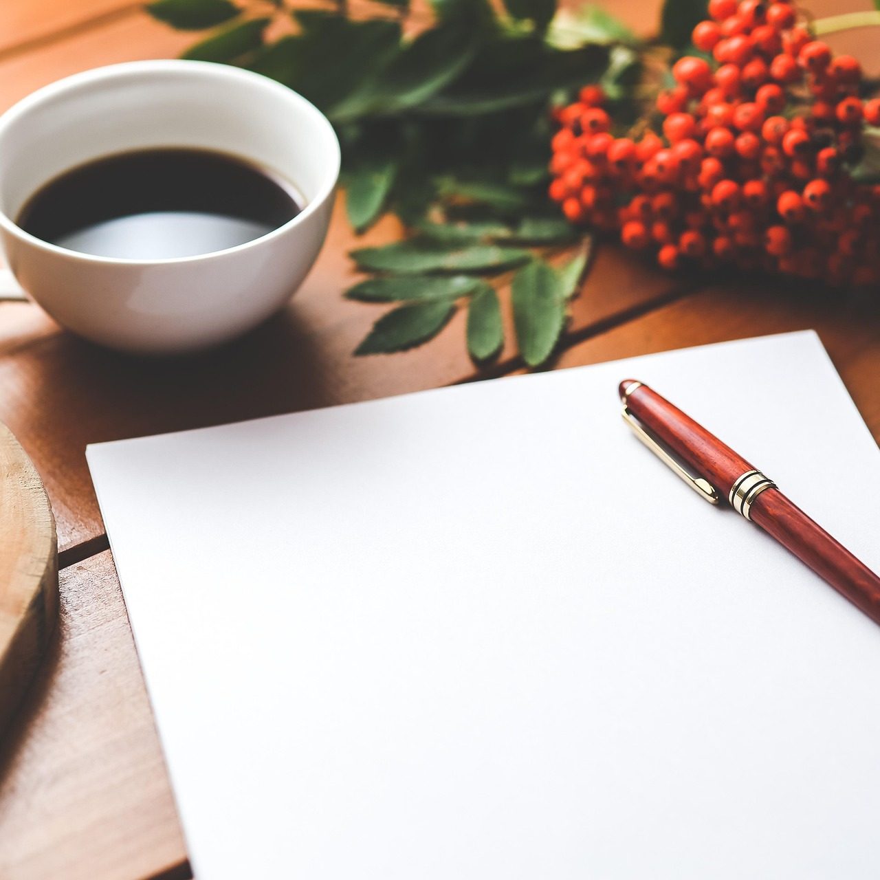 coffee, pen and paper